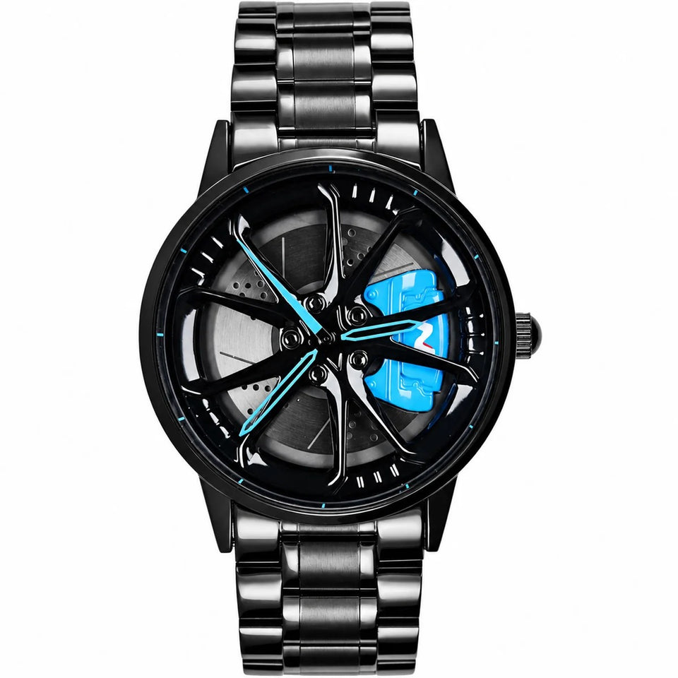 Reloj RNF de caja y brazalete negros, esfera de llanta negra con pinza y agujas azules. Fotografía frontal.
