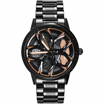 Reloj RNF de caja y brazalete negros, esfera de llanta negra con detalles y pinza en color bronce. Fotografía frontal.